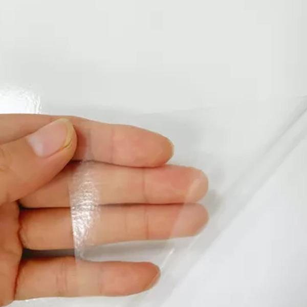 Imagem de Adesivo Vinil Transparente Papel Plástico Cristal P/ Encapar Laminação Envelopar Resistente Vidro