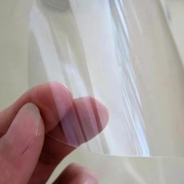 Imagem de Adesivo Vinil Transparente Papel Vinílico Plástico Cristal P/ Encapar Laminação Envelopar Vidro Mesa