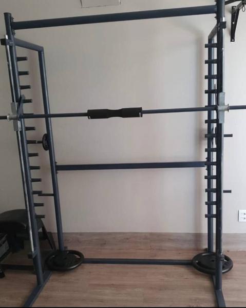 Barra Guiada Smith Tubular + 2 Travas de segurança profissional - Marrones sport Imagem de Barra Guiada Smith Tubular + 2 Travas de segurança profissional