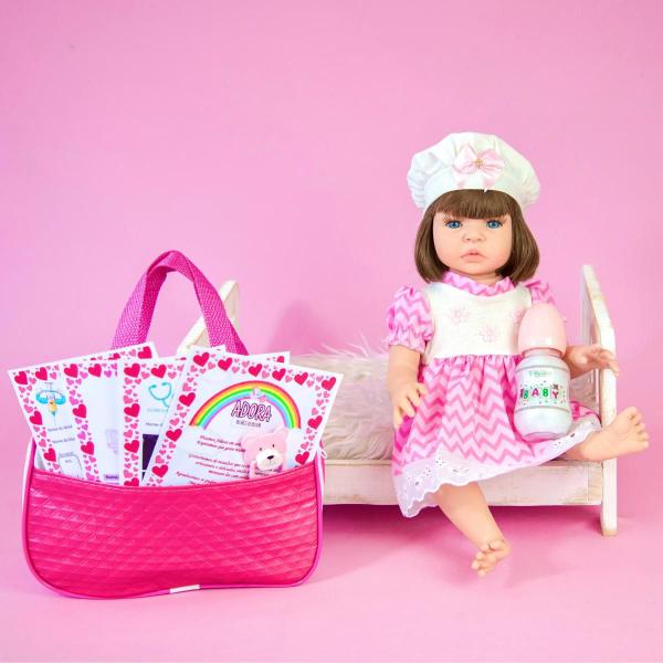 Imagem de Bebê Reborn Boneca Realista Em Silicone Bolsa Maternidade Vestido Listrado Pode Dar Banho Pronta Entrega