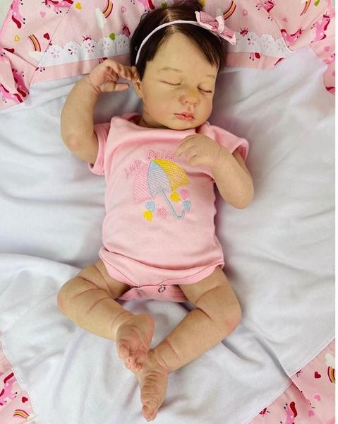 Bebê Reborn Lou Lou Rosa Dormindo Silicone - Ana Dolls Imagem de Bebê Reborn Lou Lou Rosa Dormindo Silicone