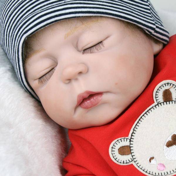 Imagem de Bebê Reborn Menino Cabelo Fio a Fio Corpo de Silicone Olhos