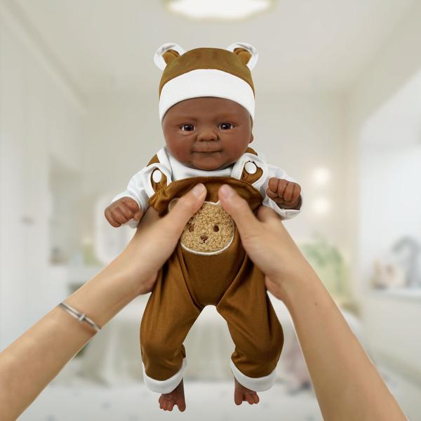 Imagem de Bebê Reborn Realista Brastoy Boneca Silicone Sólido 35cm Com Kit Conjunto de Roupa Chupeta Mamadeira e Pelúcia Pode Tomar Banho