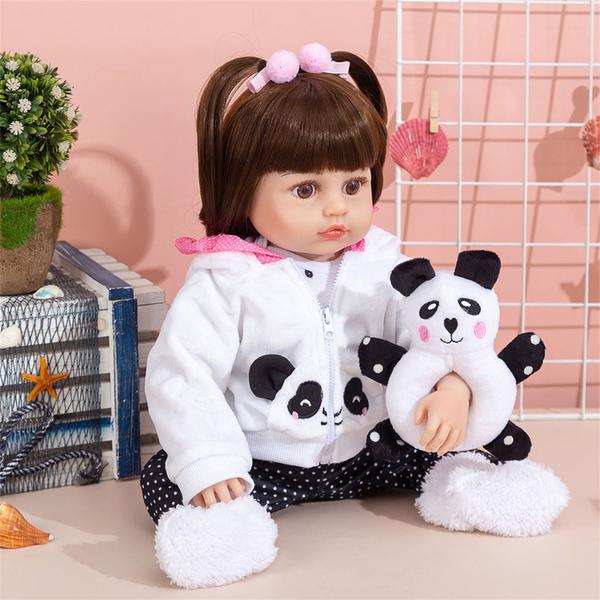 Imagem de Boneca Bebê Reborn Menina Pandinha Realista Brastoy 100% Silicone Pode Dar Banho Conjunto de Roupa Chupeta Mamadeira e Pelúcia