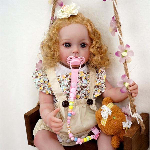 Imagem de Boneca Bebê Reborn Realista Brastoy Silicone Pode Dar Banho Conjunto de Roupa Chupeta Mamadeira e Pelúcia