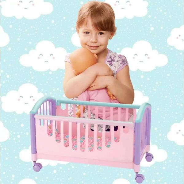 Imagem de Boneca Brinquedo Baby Elisi Com Bolsinha e Berço Vira Cama