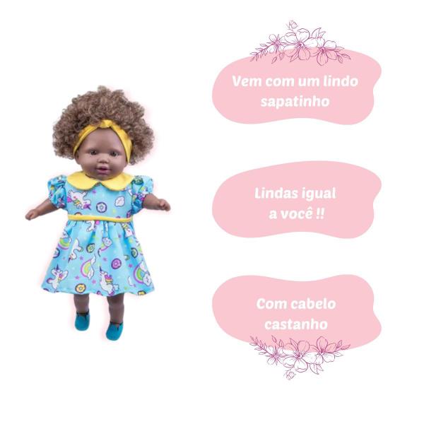 Boneca Negra Tayla Bebê Feita Em Vinil Com Cabelo Cacheado Castanho Original Brinquedo Cotiplás Imagem de Boneca Negra Tayla Bebê Feita Em Vinil Com Cabelo Cacheado Castanho Original Brinquedo Cotiplás