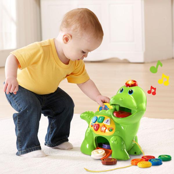 Imagem de Brinquedo dinossauro interativo para crianças, VTech, mais de 130 canções, melodias, sons e frases.