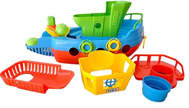 Brinquedo Educativo Embarcadinho Com 5 Peças Empilháveis Coloridas - Tateti - TA TE TI Imagem de Brinquedo Educativo Embarcadinho Com 5 Peças Empilháveis Coloridas - Tateti