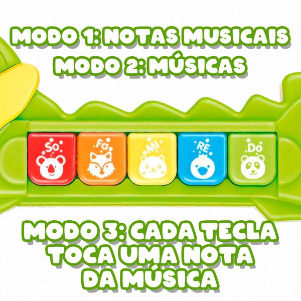 Imagem de Brinquedo Guitarra Jacaré Infantil Pedagógica Para Bebês Com Luz E Som Dm Toys