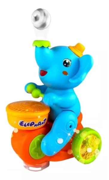 Imagem de Brinquedo Infantil Elefante Equilibrista Assopra Bola E Bate e Volta Com Luzes