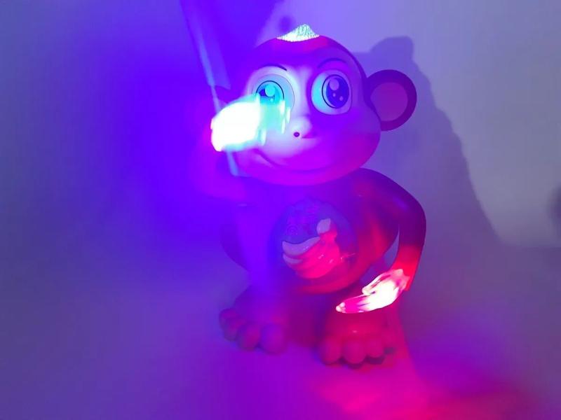 Brinquedo Macaco Divertido Musical Dançante Com Luzes. - DM TOYS Imagem de Brinquedo Macaco Divertido Musical Dançante Com Luzes.