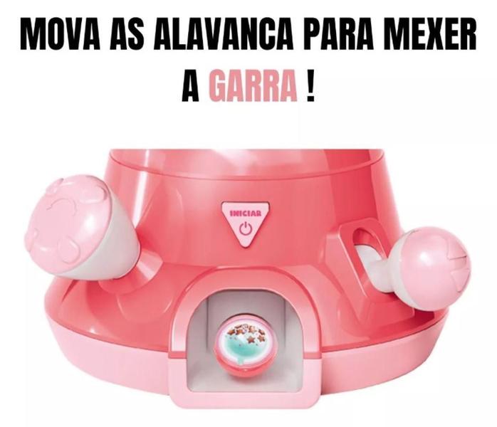 Brinquedo Mini Maquina Garra Divertida Pega Bolinha Dm Toys Imagem de Brinquedo Mini Maquina Garra Divertida Pega Bolinha Dm Toys
