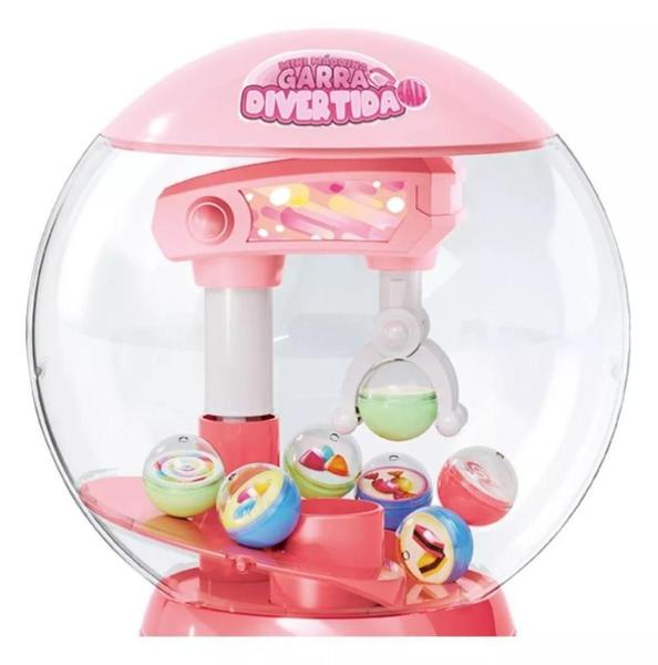 Brinquedo Mini Maquina Garra Divertida Pega Bolinha Dm Toys Imagem de Brinquedo Mini Maquina Garra Divertida Pega Bolinha Dm Toys