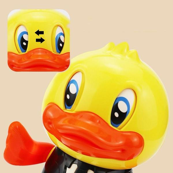 Imagem de Brinquedo Patinho Duck Musical Com Gravata Super Dançarino Brilha No Escuro Com Luzes Em Led