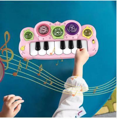 Imagem de Brinquedo Teclado Infantil  12 Teclas Interativa Com Som e Luz  Rosa