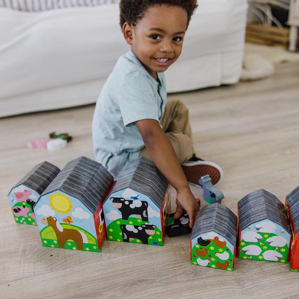 Imagem de Brinquedos para aprendizagem de números Melissa e Doug Nesting Barns 2+