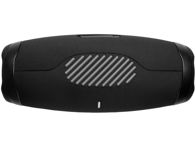 A JBL Boombox 3 está sobre uma mesa limpa e moderna. Seu design elegante e seus poderosos alto-falantes são destacados pela decoração minimalista ao redor.