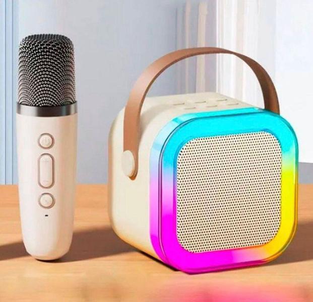 Caixinha de som Karaoke com microfone led RGB bluetooth muda voz colorida - Xtrad Imagem de Caixinha de som Karaoke com microfone led RGB bluetooth muda voz colorida