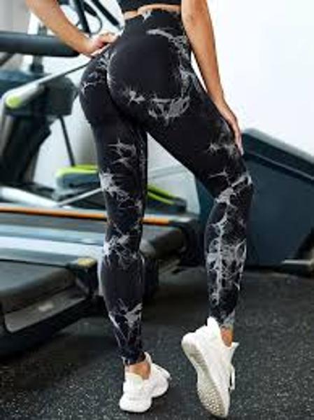 Imagem de Calça legging, feminina, tamanho unico, preto com detalhes em branco