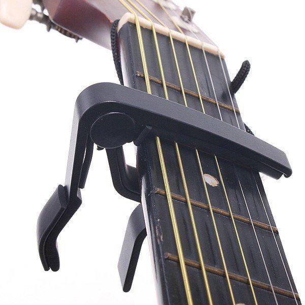Capotraste Para Violão E Guitarra Braçadeira Curva Guitar - MXT Imagem de Capotraste Para Violão E Guitarra Braçadeira Curva Guitar