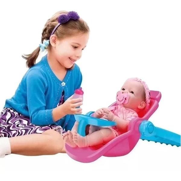 Imagem de Carrinho De Boneca Rosa 3 Em 1 Vira Bebê Conforto Cadeirinha