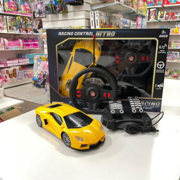 Carro Carrinho Controle Remoto Grande Sem Fio Volante Pedais Luzes - Multilaser / Multikids Imagem de Carro Carrinho Controle Remoto Grande Sem Fio Volante Pedais Luzes