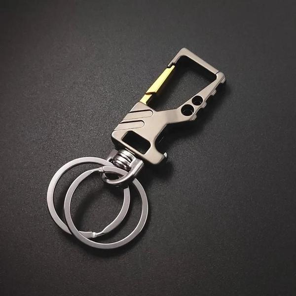 Chaveiro de Metal Resistente com Abridor de Garrafas e Mosquetão - Para Homens e Mulheres Imagem de Chaveiro de Metal Resistente com Abridor de Garrafas e Mosquetão - Para Homens e Mulheres