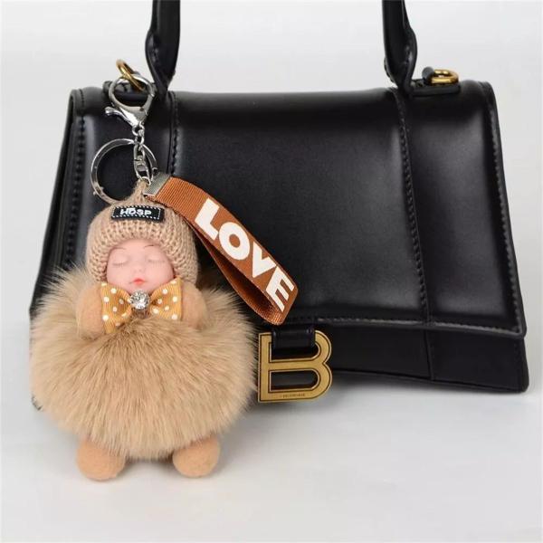 Imagem de Chaveiro Fashion Bonequinha Pom Pom Soninho