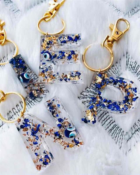 Chaveiro Personalizados Tassel 26 Letras Pendente Para Mulheres Resina Chaveiros Meninas Acessório Bolsa Deramant - N&C Imagem de Chaveiro Personalizados Tassel 26 Letras Pendente Para Mulheres Resina Chaveiros Meninas Acessório Bolsa Deramant