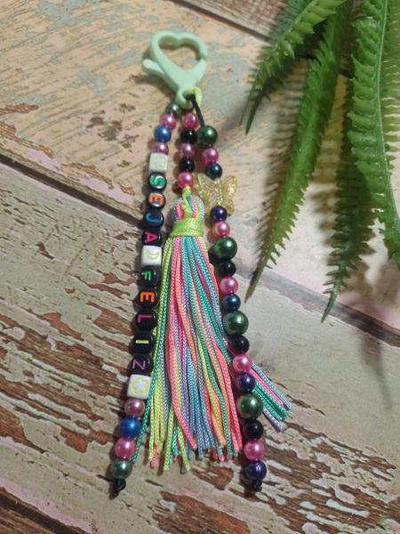 Chaveiros motivacionais em pérolas com tassel - Ateliê DY Princesas Imagem de Chaveiros motivacionais em pérolas com tassel