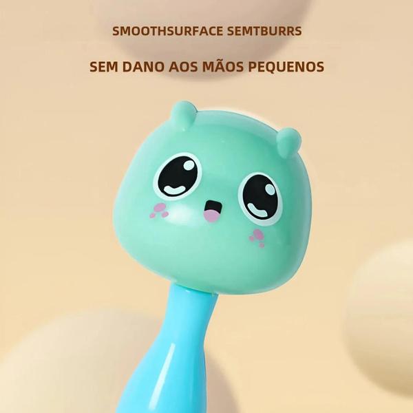 Imagem de Chocalho com design dinossauro para bebê, brinquedo com areia martelo, quebra-cabeça para bebê