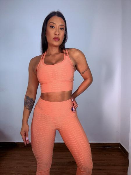 Conjunto bolha top cruzado e legging - Rangels Moda Fitness Imagem de Conjunto bolha top cruzado e legging