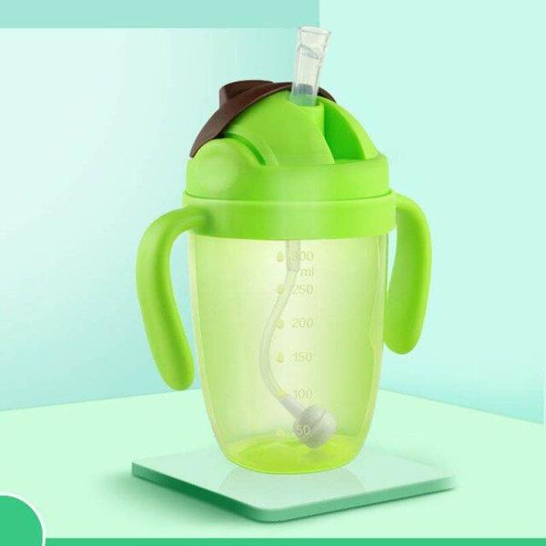 Copos de garrafas de alimentação de sucção de 300ml para bebês Mamadeira de leite de leite baby feeding mamadeira infantil treinamento infantil com copos de alça Xícaras (Verde) - HTTN Imagem de Copos de garrafas de alimentação de sucção de 300ml para bebês Mamadeira de leite de leite baby feeding mamadeira infantil treinamento infantil com copos de alça Xícaras (Verde)