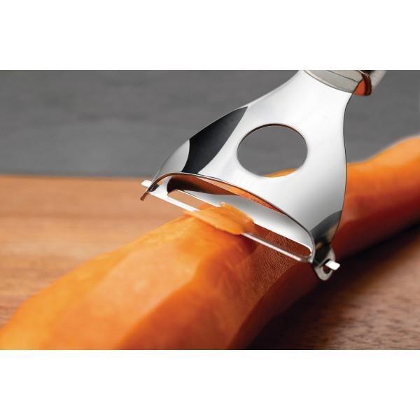 Descascador de frutas e legumes em aço inox e cabo plástico multiuso - Filó Modas Imagem de Descascador de frutas e legumes em aço inox e cabo plástico multiuso