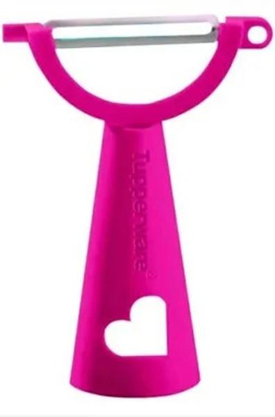 Descascador de legumes rosa pink da tupperware Imagem de Descascador de legumes rosa pink da tupperware
