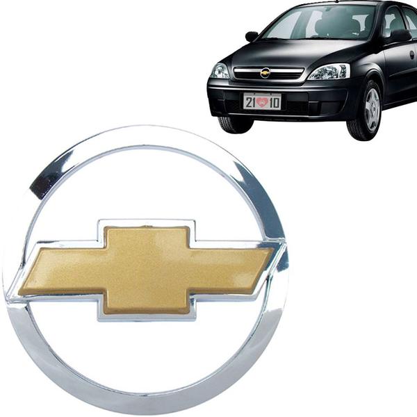 Imagem de Emblema Grade Corsa Hatch Sedan Montana 02/12 Com Gravata Dourada