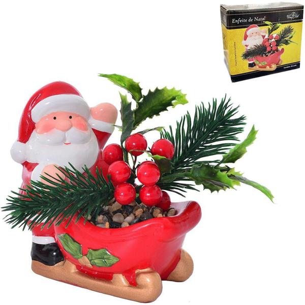 Imagem de Enfeite de porcelana papai noel no treno com flor artificial + pinha 10,6x10,5x6cm - WINCY