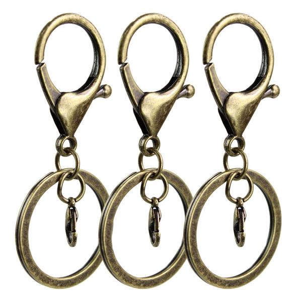 Fecho Mosquetão De Metal Com Argola Italiana 30mm Para Chaveiros 10 unidades - RussoArt Imagem de Fecho Mosquetão De Metal Com Argola Italiana 30mm Para Chaveiros 10 unidades