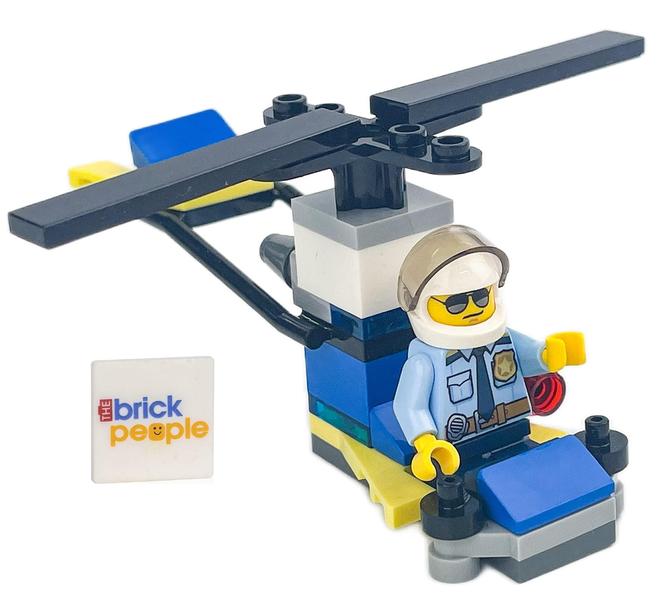 Imagem de Figura LEGO City Police Man com helicóptero de 5 cm de altura com bônus