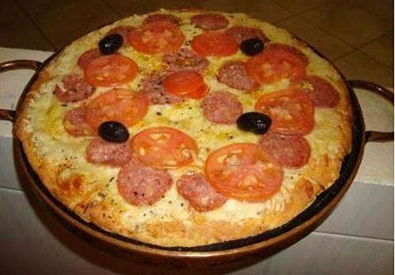 Imagem de Forma de pizza em pedra sabão de 25 cm