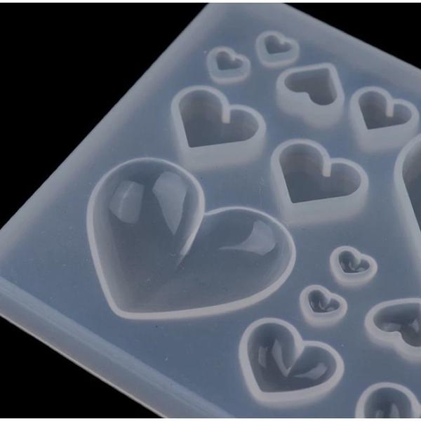 Forma Molde Silicone Resina Sabonete Coração 14 Cav - Decore Artesanatos SP Imagem de Forma Molde Silicone Resina Sabonete Coração 14 Cav