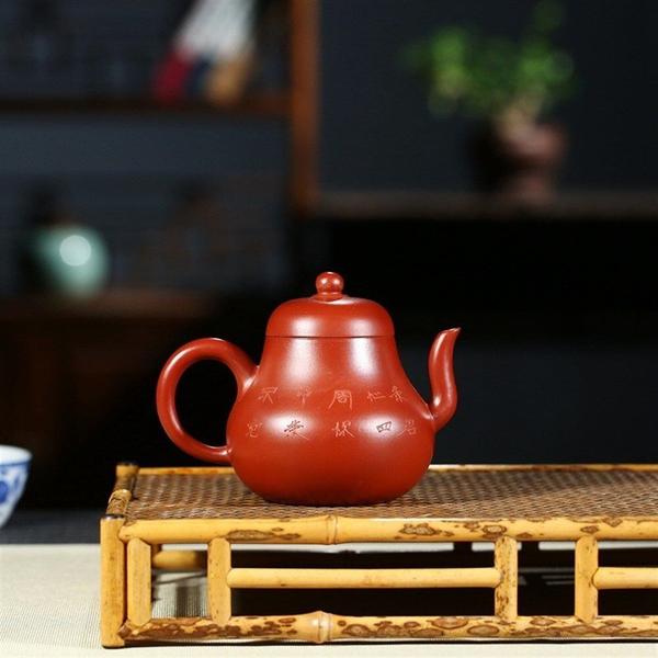 Imagem de Fortune Ore Teapot Pot Edge Of The Famous Big Red Siting Painted Clay Pot Teapot Teapot Teapot Bules