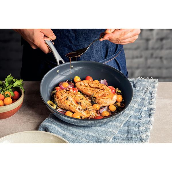 Frigideira Tramontina Grano em Aço Inox com Corpo Triplo Cerâmico Grafite 26 cm Imagem de Frigideira Tramontina Grano em Aço Inox com Corpo Triplo Cerâmico Grafite 26 cm
