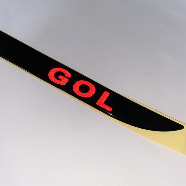 Imagem de Friso Porta-malas Preto Gol G5 2009/2013 + Emblema Vermelho