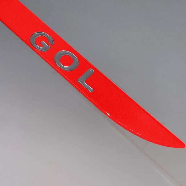 Imagem de Friso Porta Malas Vermelho Gol G5 2009/13 + Emblema Cromado