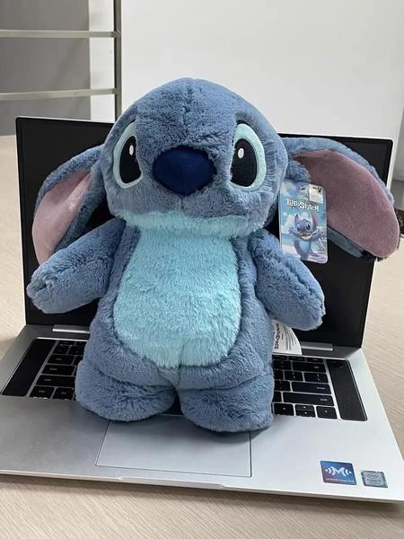 Imagem de Garrafa Térmica Portátil Stitch e Lotso - Pelúcia Disney