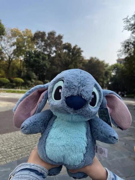 Imagem de Garrafa Térmica Portátil Stitch e Lotso - Pelúcia Disney