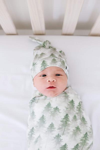 Imagem de Grande tricô premium baby swaddle recebendo cobertor evergreen por pérola de cobre