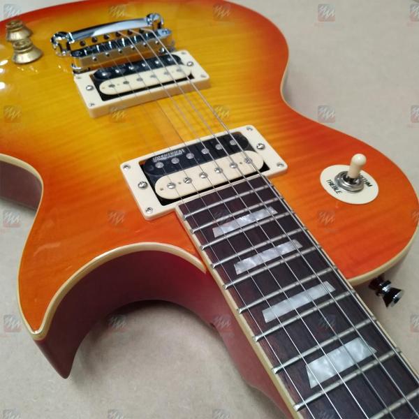 Imagem de Guitarra Les Paul Braço Colado Vintage V100 Thb Honeyburst - Vintage